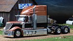International Lonestar Truck 2010 (Met.Orange/Black) by IXO MODELS